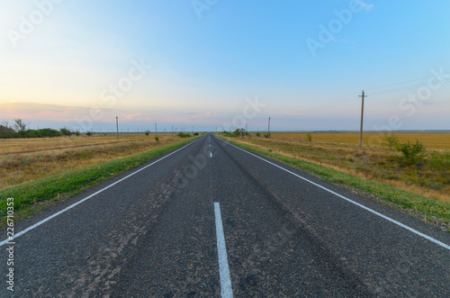 Paved road in the steppe.