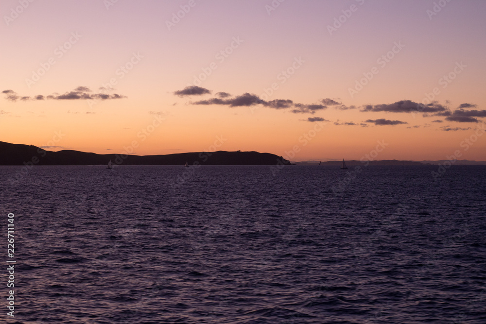 Sunset at the bay on Waiheke Island, Auckland, New Zealand