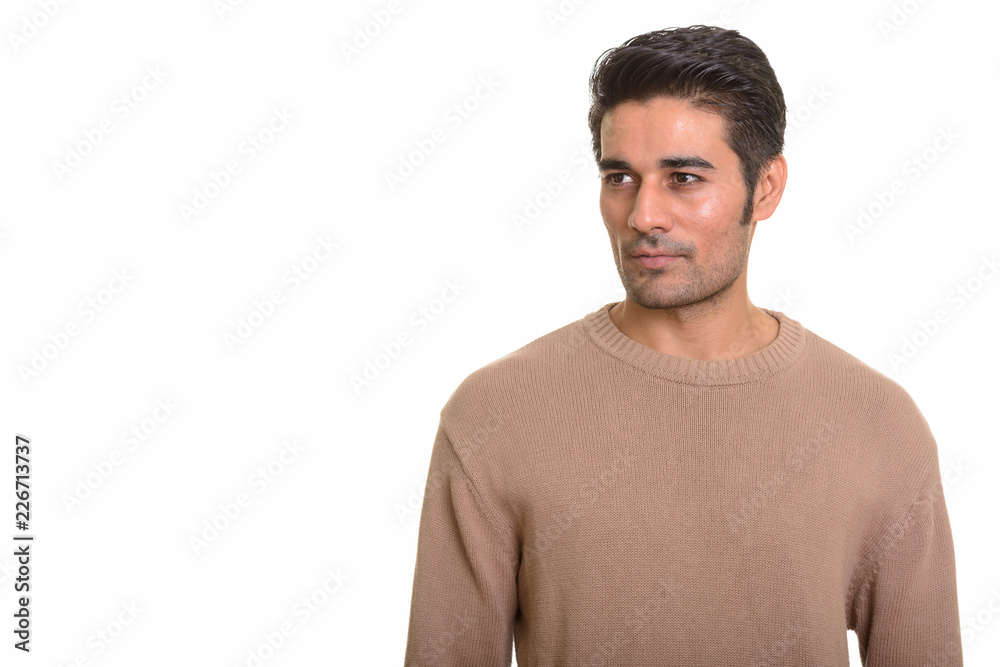 Young handsome Persian man against white background Young handsome Persian man against white background