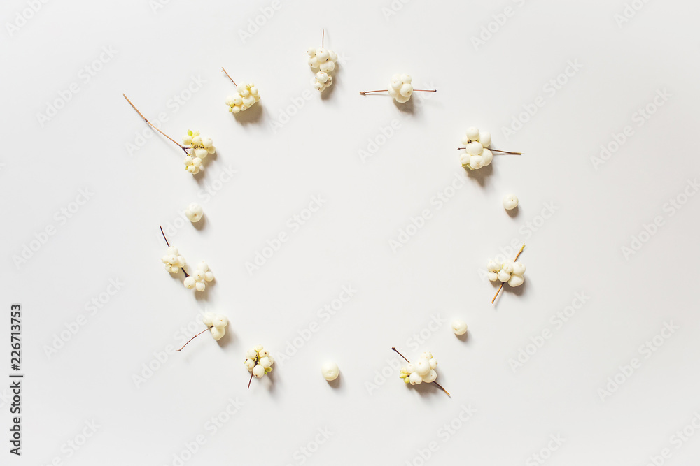 White balls on a white background. Christmas composition, flat, top view