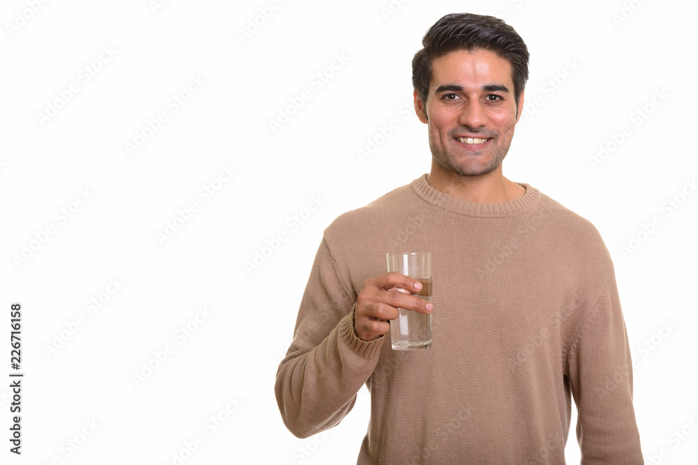 Young handsome Persian man against white background Young handsome Persian man against white background