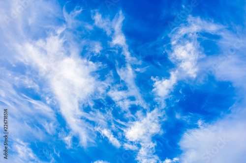 beautiful clouds floating on a blue sky  background image with space for text