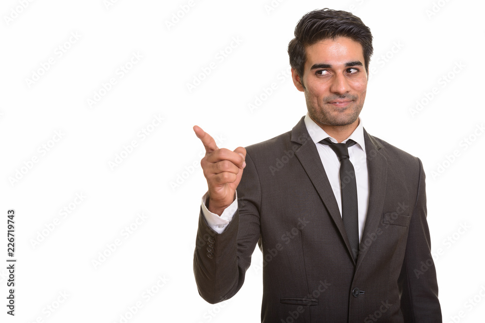 Young handsome Persian man against white background Young handsome Persian man against white background