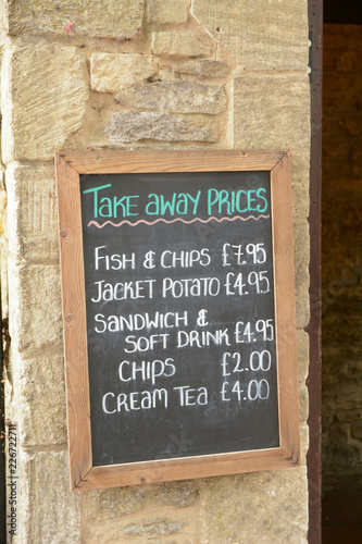 Take Away Prices menu sign outside cafe