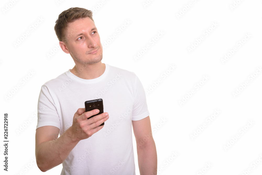 Handsome Caucasian man isolated against white background Handsome Caucasian man isolated against white background