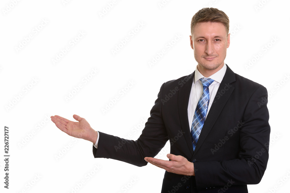 Handsome Caucasian man isolated against white background Handsome Caucasian man isolated against white background