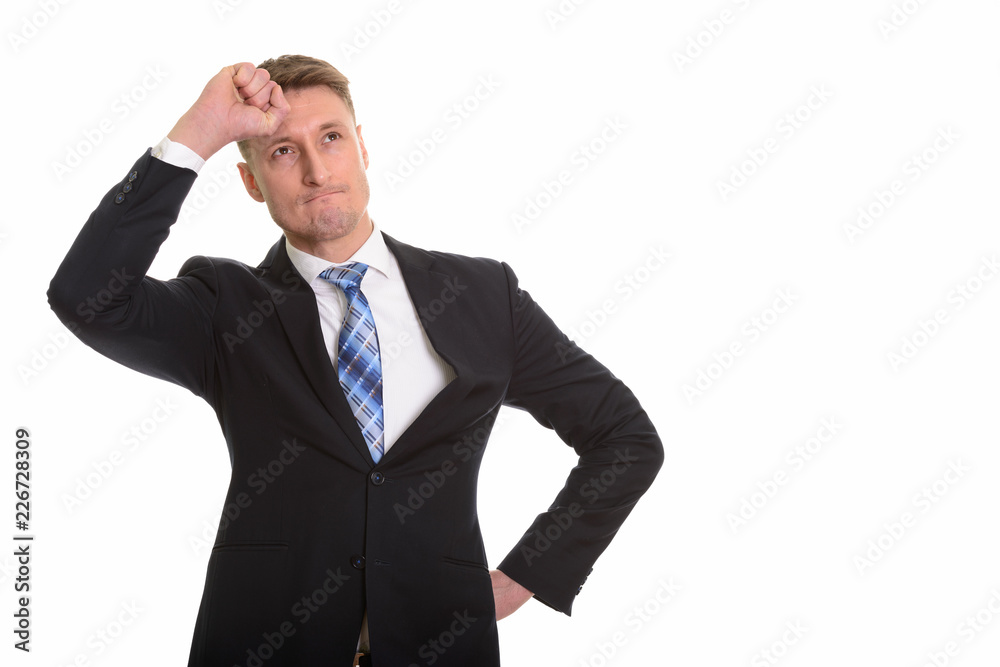 Handsome Caucasian man isolated against white background Handsome Caucasian man isolated against white background