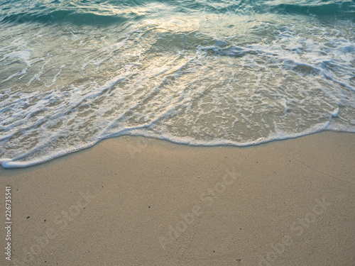 Soft wave on the beach in the morning.