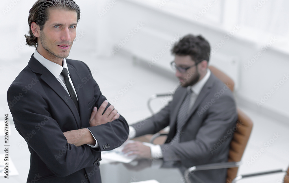 Portrait of businessman standing in office Portrait of businessman standing in office