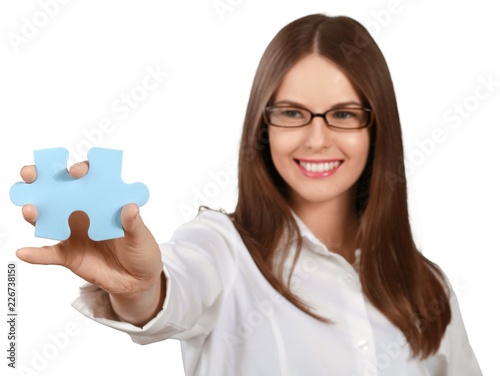 Businesswoman with Puzzle Piece - Isolated