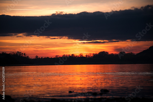 sunset over the lake © Dawid G