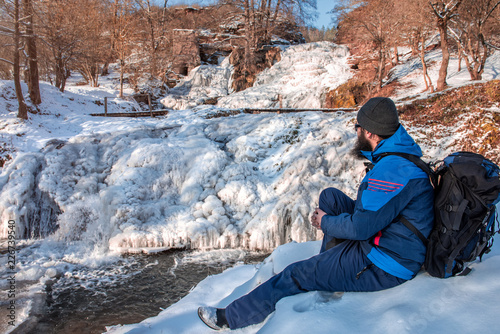 Man enjoying the winter landscape photo