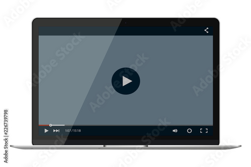 Modern glossy laptop with video player mockup on screen.