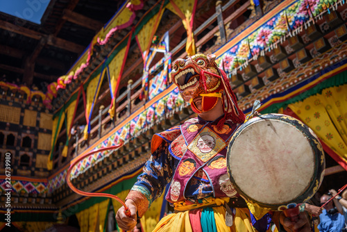 Bhutan Monk dancing for colorful mask dance at yearly Paro Tsechu festival in Bhutan