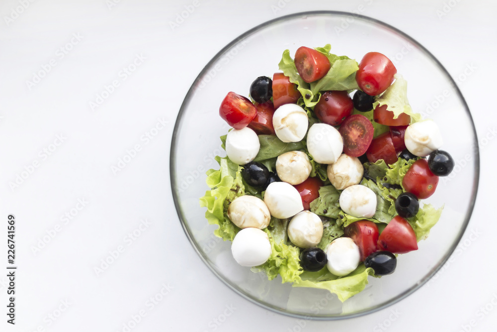 Vegetable salad with cherry tomato, olives, mozarella and vinegar Vegetable salad with cherry tomato, olives, mozarella and vinegar