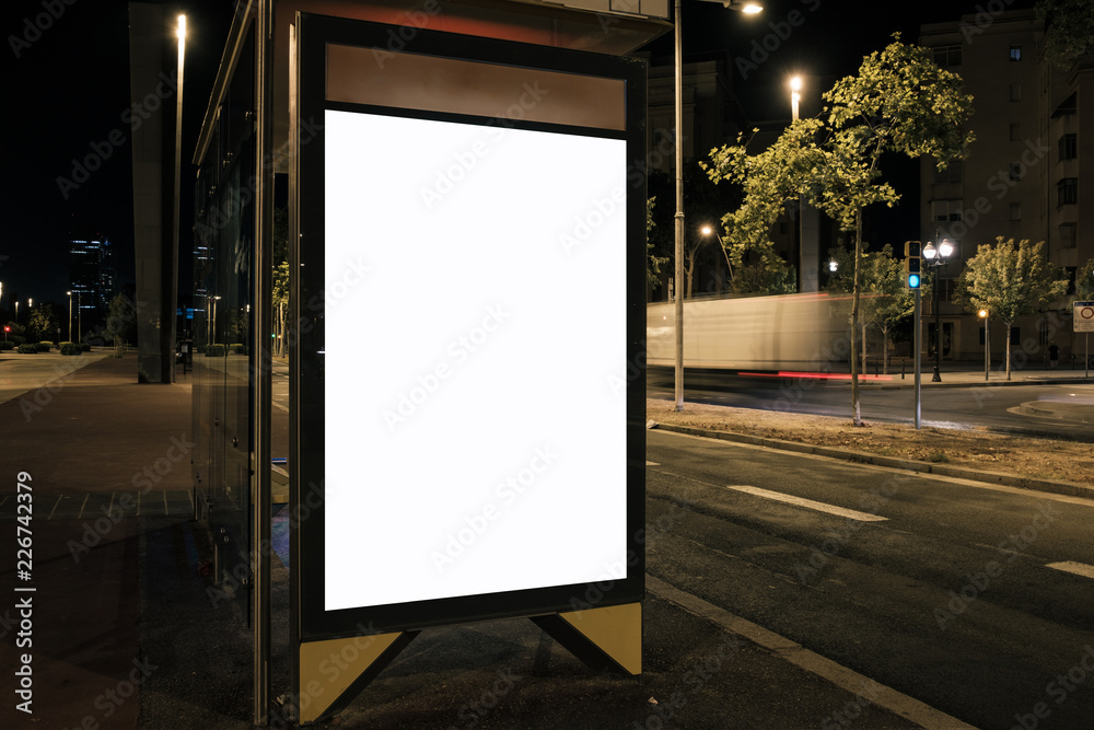 Light box for advertising with white blank space at bus stop. Night mock-up design concept. Horizontal Light box for advertising with white blank space at bus stop. Night mock-up design concept. Horizontal