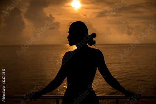silhouette of a woman at sunset