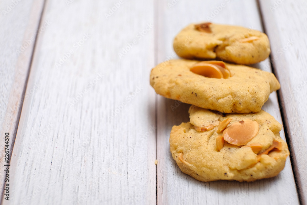 Hazelnuts cookies on white wooden table