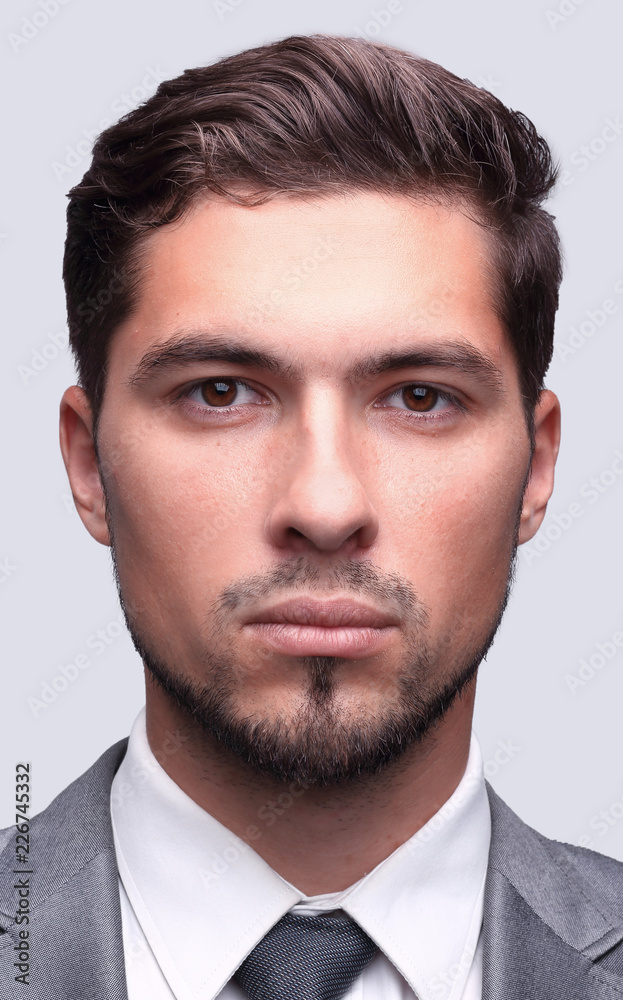 closeup face of a successful businessman closeup face of a successful businessman