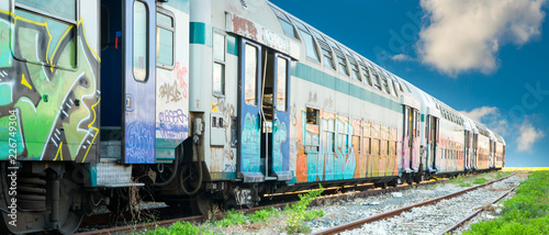Abandoned train with graffiti - Treno abbandonato con graffiti photo