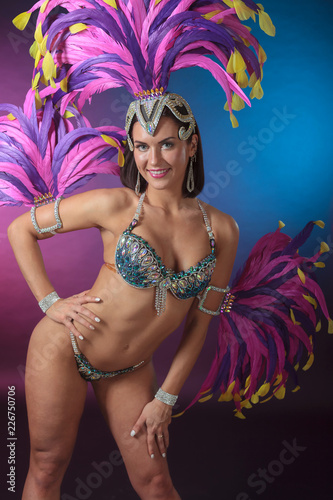 Canvas Print Beautiful  woman in carnival costume with rhinestones and natural feathers