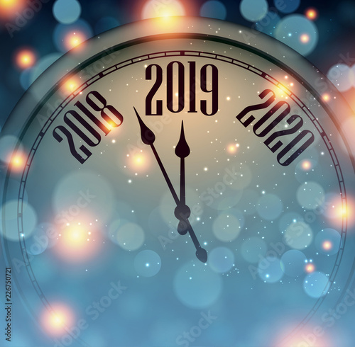 Blue blurred New Year 2019 card with clock.