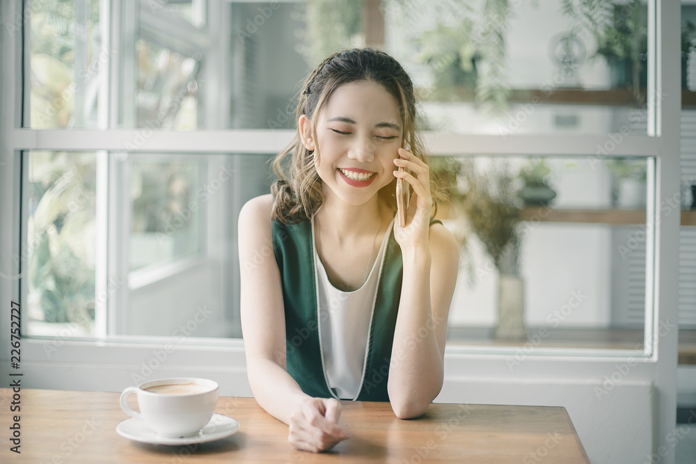 Beautiful Freelancer Woman working online at her home.
Beautiful Freelancer Woman working online at her home.