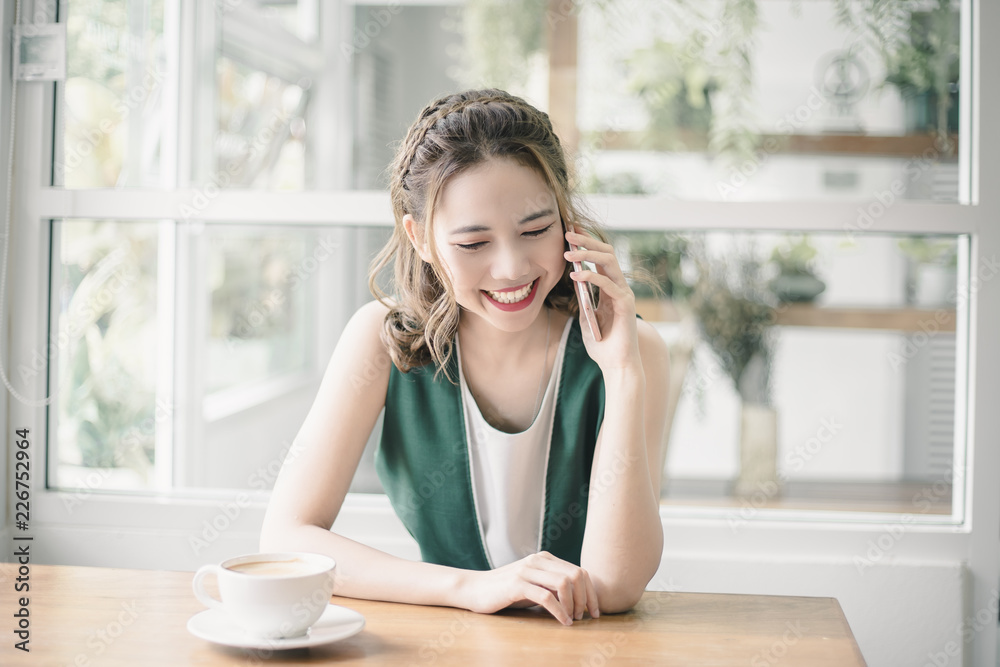 Beautiful Freelancer Woman working online at her home.
Beautiful Freelancer Woman working online at her home.
