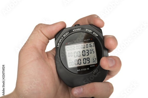 Close Up Of Hand Holding Digital Stopwatch on White Background