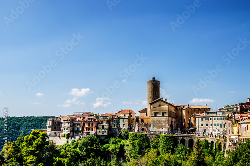 The houses of the town of Nemi, located above the cliff. The surroundings of Rome. Italy. 