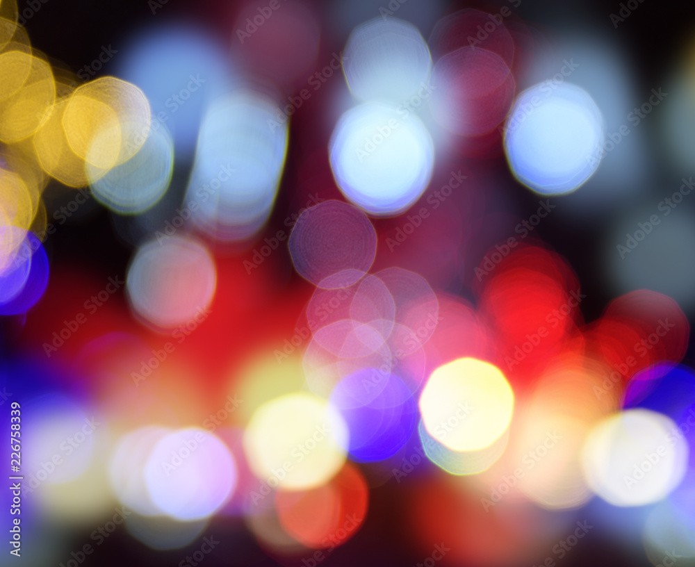 multicolored round bokeh on a black background