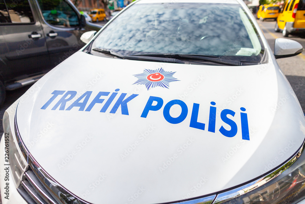 Obraz premium Police car from the turkish police Trafik Polisi stands on a street