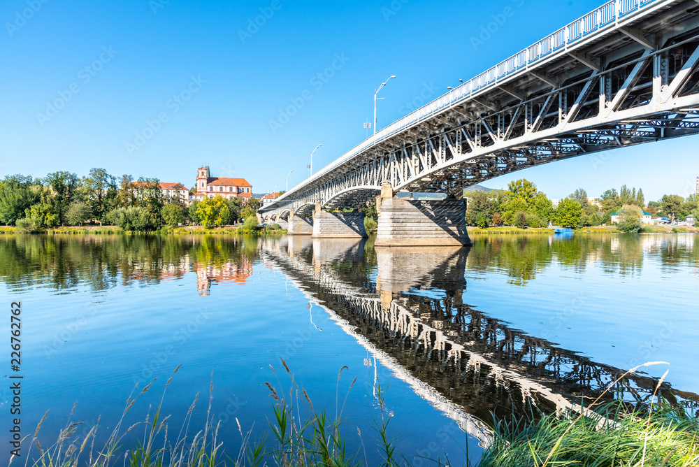 Tyrs Bridge over Labe River in Litomerice on sunny summer day, Czech Republic.