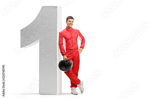 Racer leaning against number one
