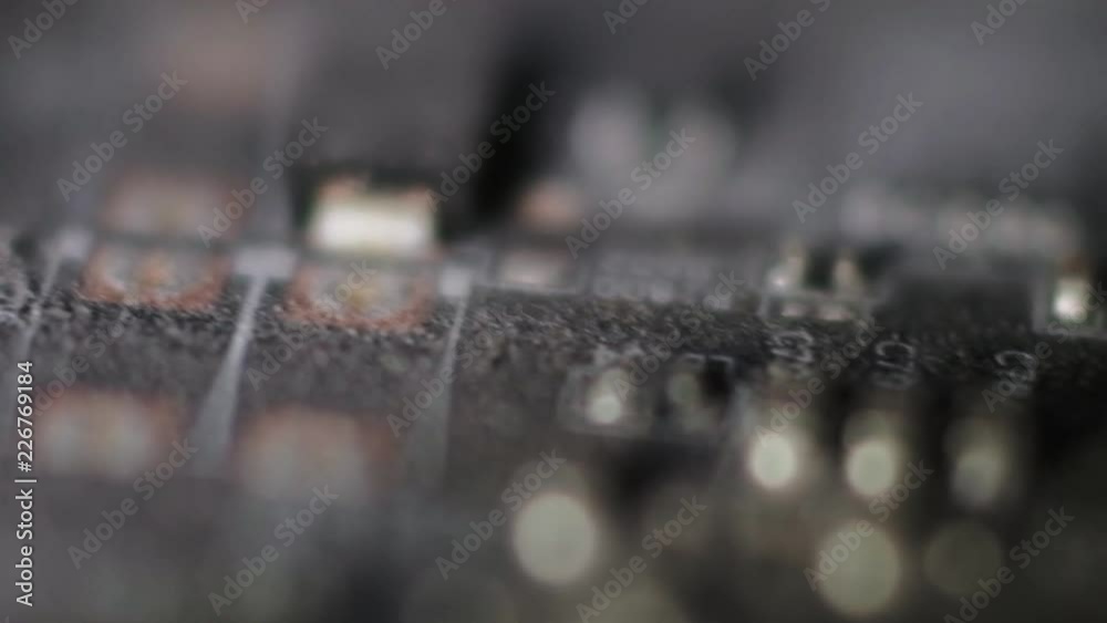 Extreme close up of old dusty electronic device, motherboard with procesor, old circuits covered with dust, dolly pan shot Extreme close up of old dusty electronic device, motherboard with procesor, old circuits covered with dust, dolly pan shot