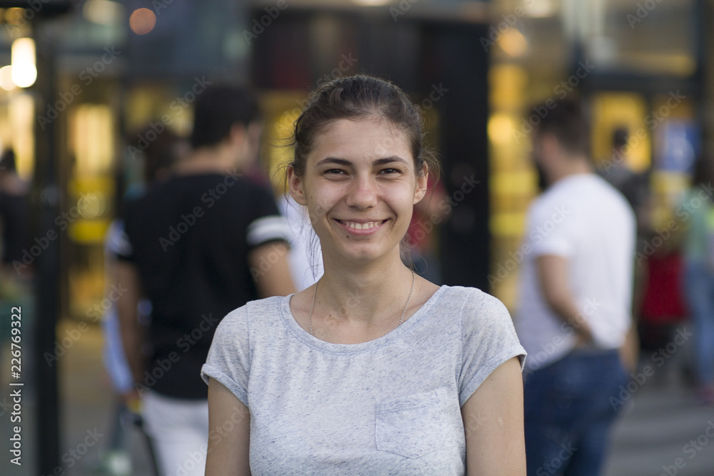 Young girl in a hat on the background of the road Young girl in a hat on the background of the road