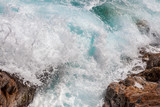 sea water splashing rocky coastline on the shores of Tossa De Mar