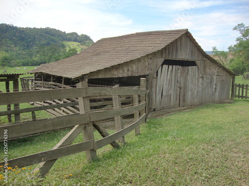 old barn in field
