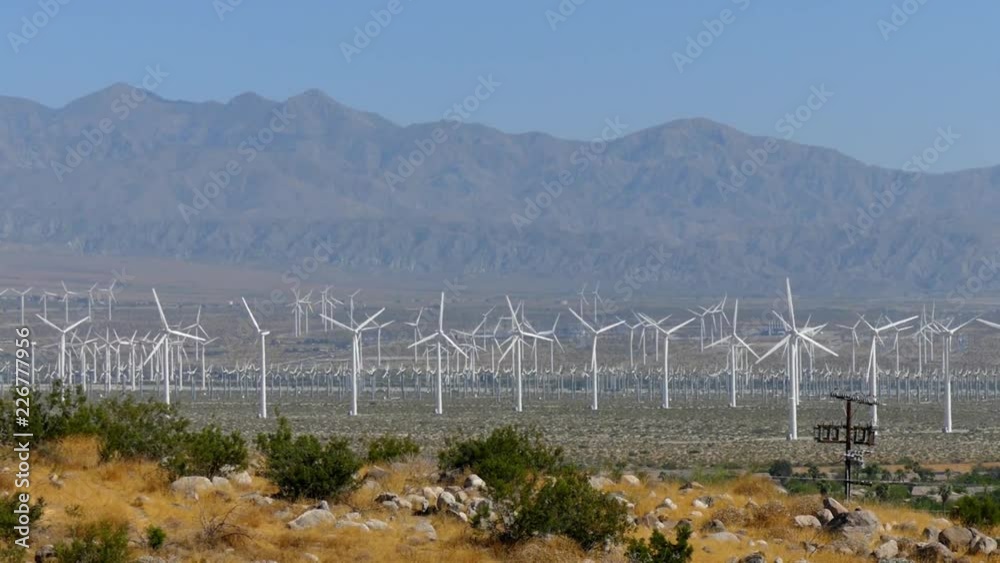 Wind turbines generating electricity at a desert wind farm near Palm Springs, California, USA Wind turbines generating electricity at a desert wind farm near Palm Springs, California, USA