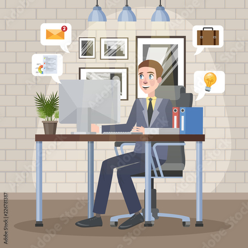 Man working on the computer at the desk
