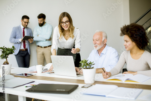 Business people discussing a strategy and working together in the modern office