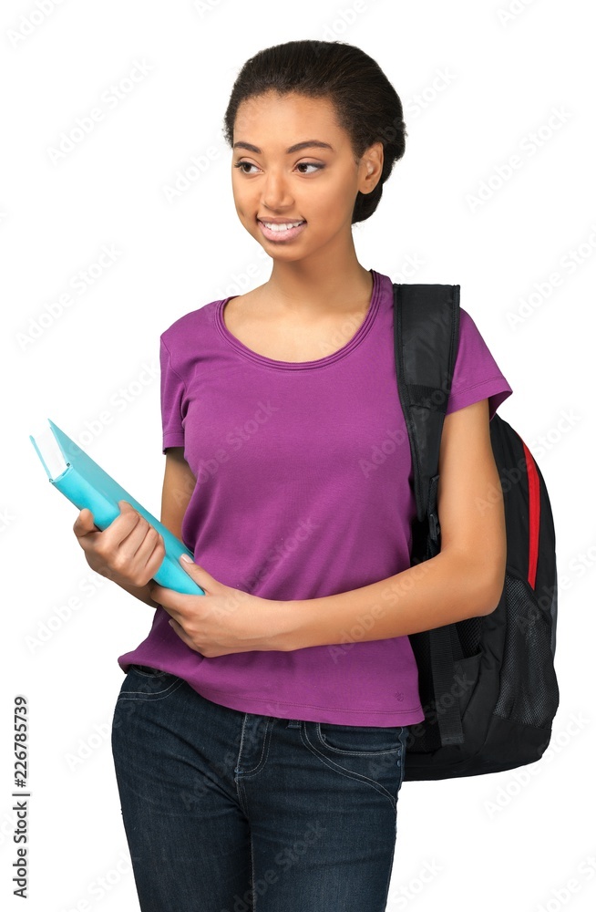 Friendly Young Girl with Backpack Holding Book - Isolated Friendly Young Girl with Backpack Holding Book - Isolated