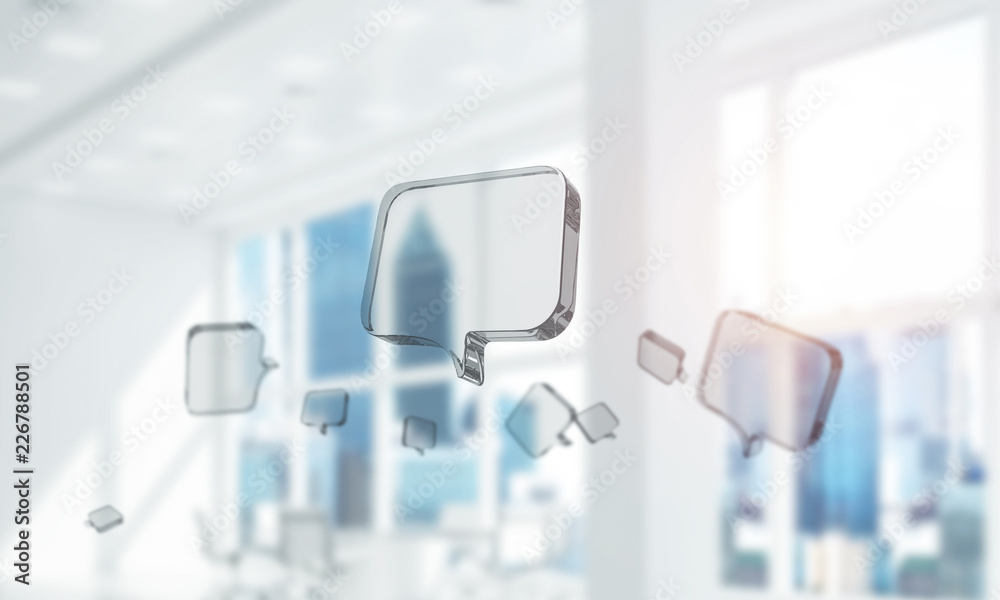 Concept of communication by glass empty chat icon on office back Concept of communication by glass empty chat icon on office back