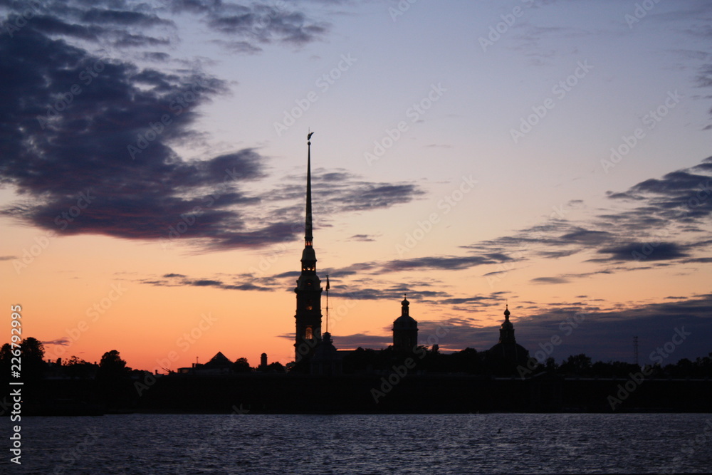 Naklejka premium silhouette of the tower at sunset