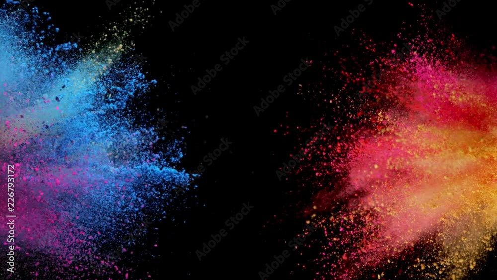 Super slow motion of coloured powder explosion isolated on black ...