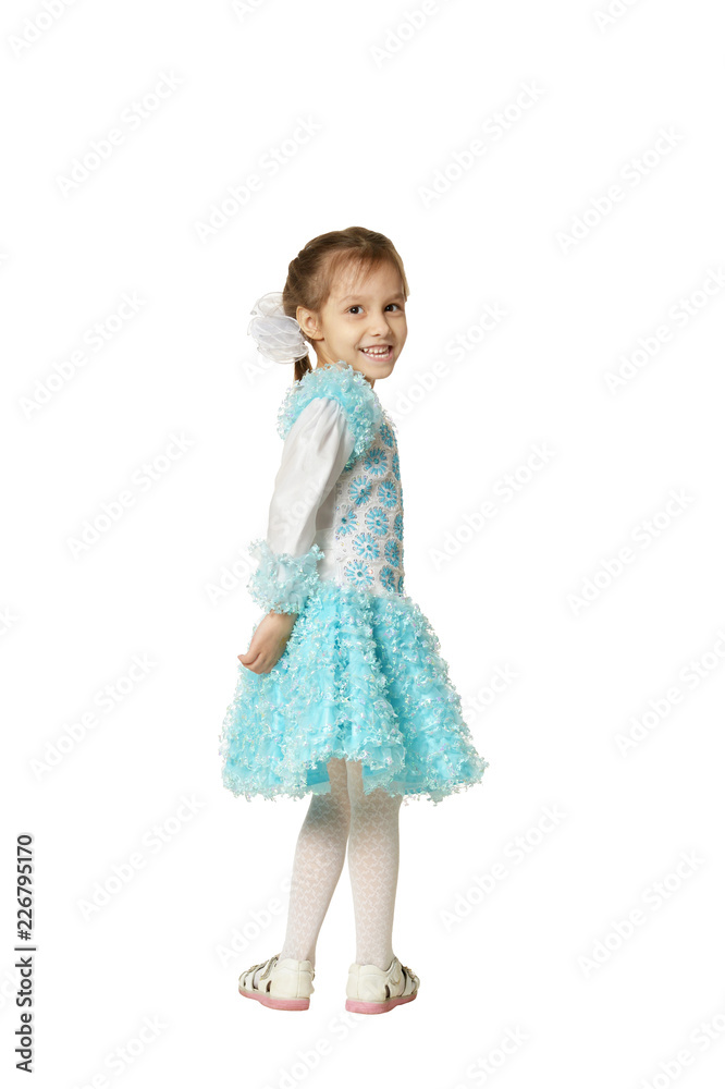 Portrait of little girl in a blue dress on white background Portrait of little girl in a blue dress on white background