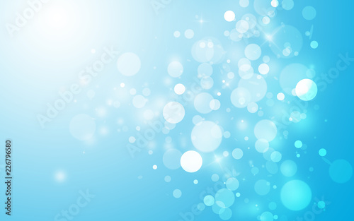 Soft blue sparkle rays lights with bokeh elegant show on stage abstract background. Dust sparks background.
