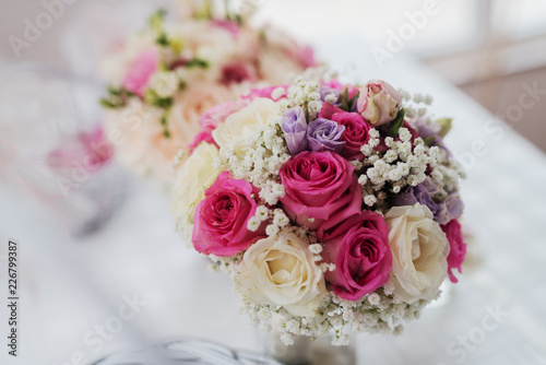 Close up of a brides bouquet with fresh colorful flowers.