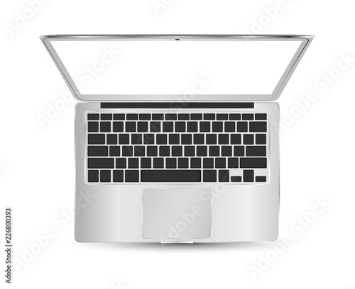 Modern laptop isolated on background. Top view.