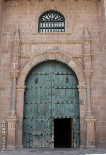 Close up of old catholic church facade in Cuzco Peru